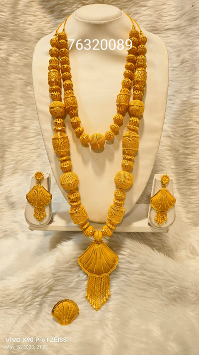 “Golden threads of tradition, woven with elegance. ✨💛 #RoyalGlow #GoldenCharm” hover