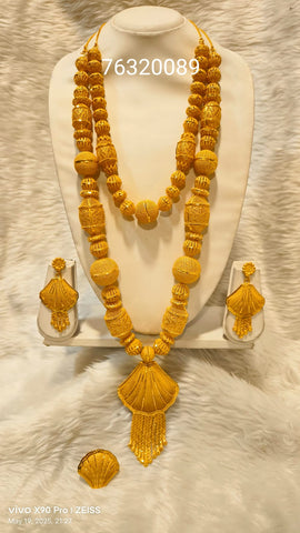 “Golden threads of tradition, woven with elegance. ✨💛 #RoyalGlow #GoldenCharm”